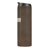 Metaal kruis op donker leder thermosbeker (Geroteerd rechts)