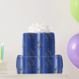 Metalen Sneeuwvlokken op Blauwe Kerst Cadeaupapier