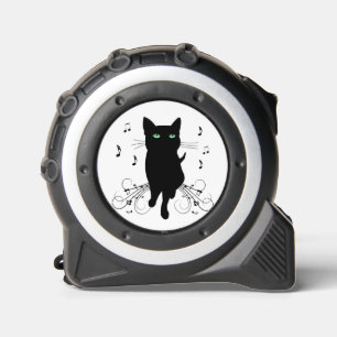 Mètre Ruban Chat noir entouré de notes de musique chuchotantes