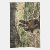 Mettez votre bébé sur une serviette de main de (Vertical)