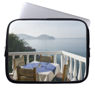 Mexico, Guerrero, Zihuatanejo. Cafétafel over Laptop Sleeve