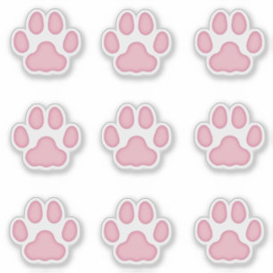 Middelgrote kattenverf drukt roze stalen kogels af sticker