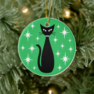 Midden eeuw zwart kat met witte sterren op groen keramisch ornament
