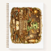 Mignon bébé dragon lisant un cahier de journal | F (Devant)