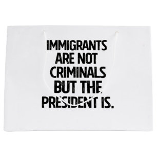Migranten zijn geen criminelen maar de president w groot cadeauzakje