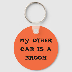 mijn andere auto is een bezemwagen sleutelhanger