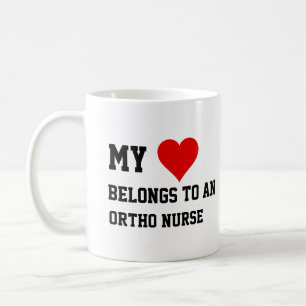 Mijn hoort bij een ortho verpleegkundige  koffiemok
