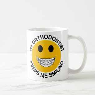 Mijn orthodontist houdt me aan het glimlachen van  koffiemok