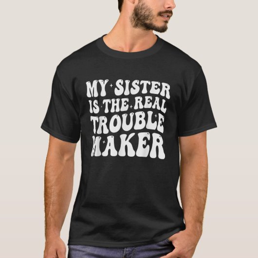 Mijn zus is de echte onruststoker grappige meisjes t-shirt (Voorkant)