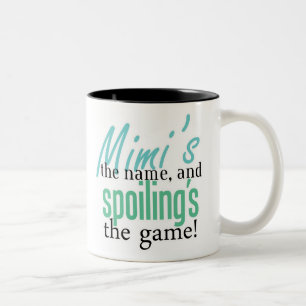 Mimi is de naam en Spoiling is het spel Tweekleurige Koffiemok