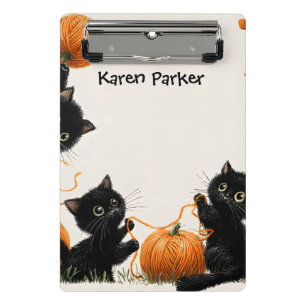 Mini Porte-bloc Chat noir avec boule en fils orange inspirée par l