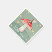 Miniatuur elfje zit bovenop een paddenstoel en glo servet (Hoek)