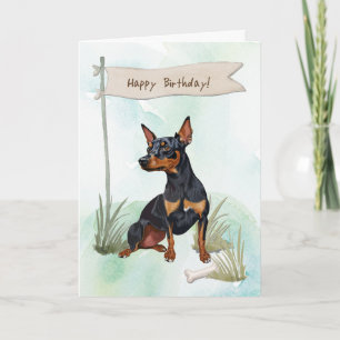 Miniatuur Pinscher hond onder verjaardagsbord Kaart