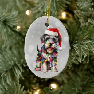 Miniatuur Schnauzer verpakt in kerstverlichting Keramisch Ornament