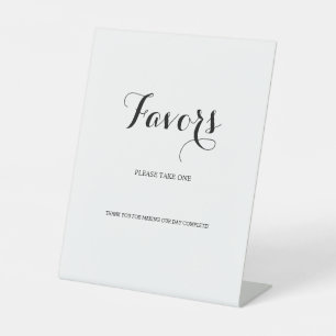 Minimale kalligrafie script gunst neem er een reclamebord met voetstuk