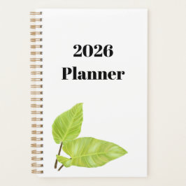 Minimale witte planner met geschilderde groene bla