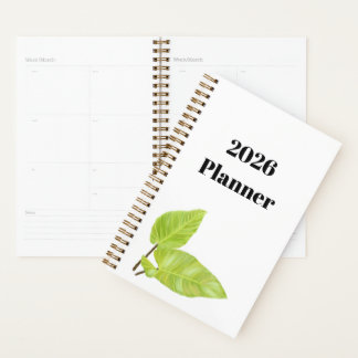 Minimale witte planner met geschilderde groene bla