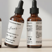 Minimalistisch etiket van essentiële olie fles