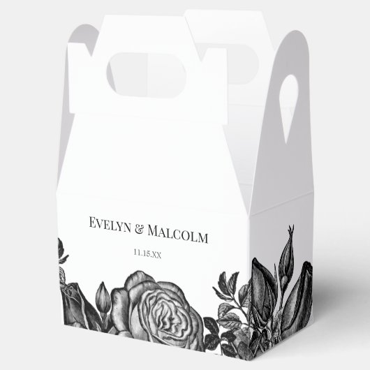Minimalistisch huwelijk tussen zwarte en witte roz bedankdoosjes (Geopend)