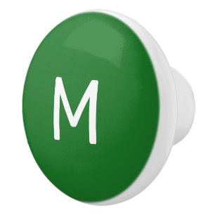 Minimalistisch wit print monogram op groen keramische knop