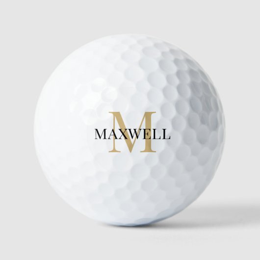 Minimalistisch zwart goudmonogram golfballen (Voorkant)