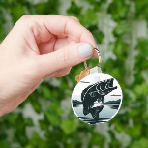 Minimalistische grote baars vissen met sprong sleutelhanger