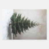 Minimalistische kerstboom met zachte lichten op sn inpakpapier vel (Voorkant)