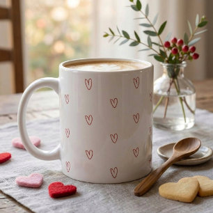 Minimalistische rode krabbelhartjes overal op de m koffiemok