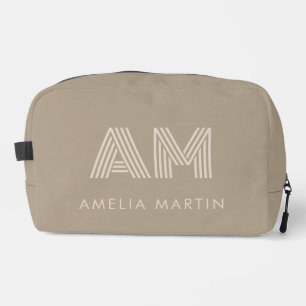 Minimalistische warme taupe monogram toilettasje