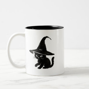 Minimalistische zwarte kat met heksenhoedendesign tweekleurige koffiemok
