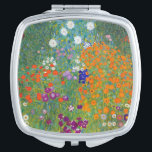 Miroir De Poche Paysage floral Gustav Klimt<br><div class="desc">Un miroir compact avec le tableau Art nouveau de Gustav Klimt (1862-1918),  Jardin aux fleurs (vers 1906). Un jardin rempli de pétunias colorés,  de masques et autres fleurs.</div>
