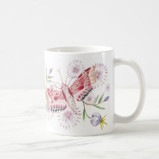 Mites et tasse de fleurs