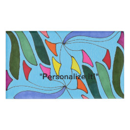 Mobiele kunst met bladvormen in meerdere kleuren naambadge