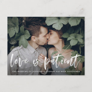 Modern Brush Script Love is Patient Postponement Aankondigingskaart
