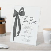Modern Elegant Coquette Zwart Bow Het Bar Sign Reclamebord Met Voetstuk (Insitu)