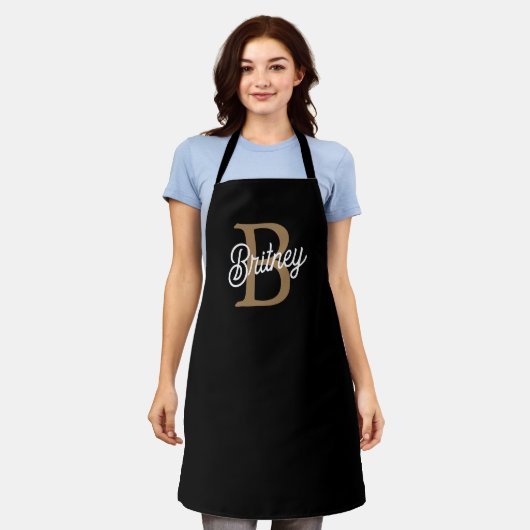 Modern Elegant Monogram Naam Zwart Goud Script Schort (Gedragen)