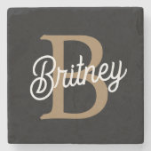 Modern Elegant Monogram Naam Zwart Goud Script Stenen Onderzetter (Voorkant)