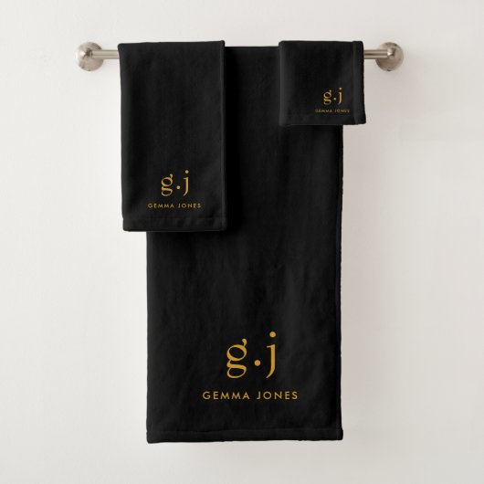 Modern goud monogram op zwart bad handdoek (Insitu)