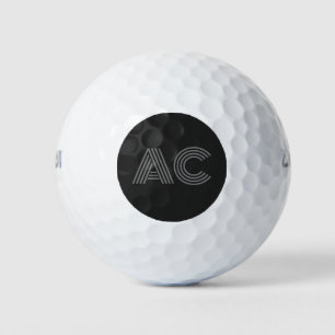 Modern zwart en grijs monogram golfballen