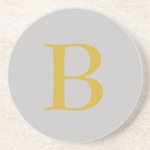 Moderne grijze gouden kleur monogram naam initiaal zandsteen onderzetter