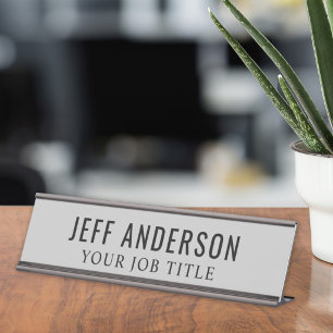 Moderne grijze kantoormedewerker bureau naambordje