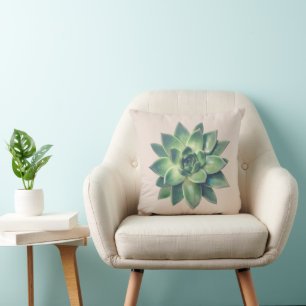 Moderne groene succulente plant op lichtbeige kussen