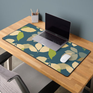 Moderne herfstbladeren met turquoise achtergrond bureaumat