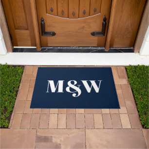 Moderne initialen voor monogrammen van witte marin deurmat