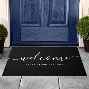 Moderne kalligrafie script Welkom familienaam Deurmat