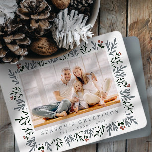 Moderne kerstavond en botanische bessen feestdagenkaart