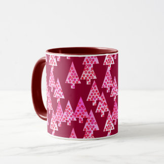 Moderne kerstbomen, wijn en roze mok