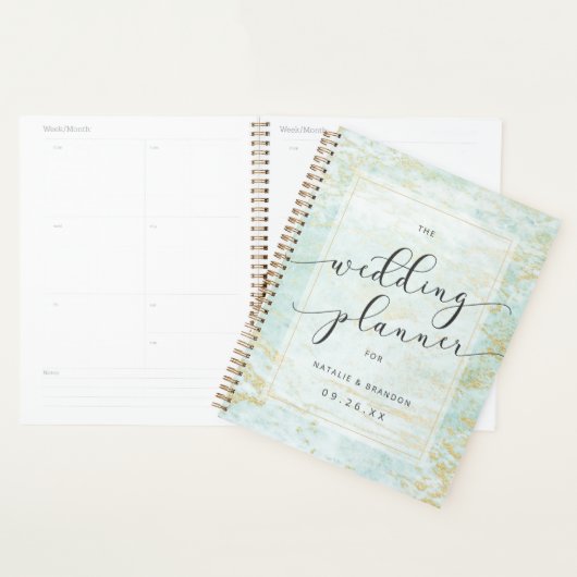 Moderne knikkers in de oceaan met gouden trouwplan planner (Display)