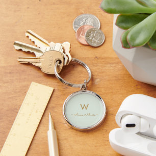 Moderne lichtgroene gouden minimalistische monogra sleutelhanger
