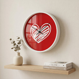 Moderne rode hart omlijste wandklok